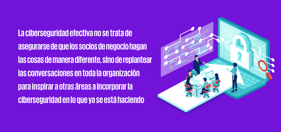 Personas conversando frente a una computadora, rodeadas de equipo electrónico